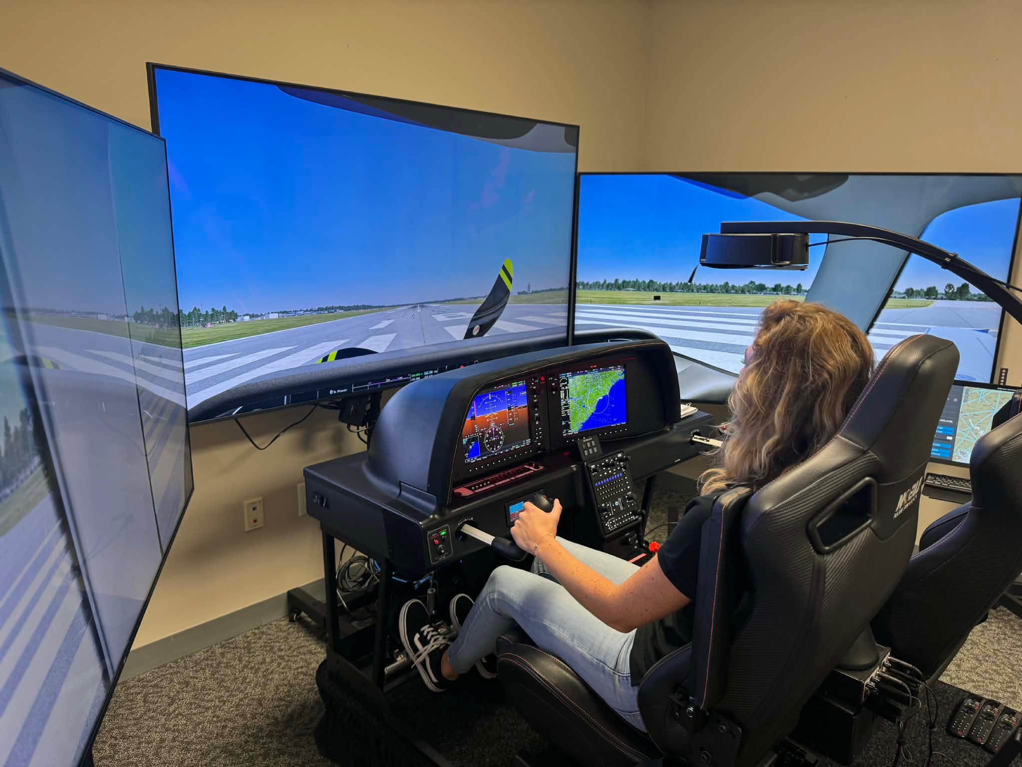 Student at the simulator controls